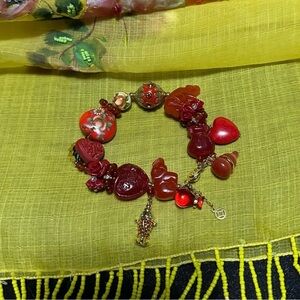 Cinnabar, Coral and Carnelian charm bracelet
